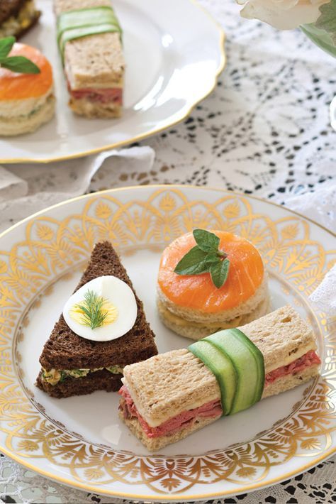 A plate of distinctively shaped sandwiches creates a hearty mix of options that will satisfy late-afternoon appetites. See recipes! - victoriamag.com Recept Sandwiches, Small Sandwiches, Tea Party Sandwiches, Tea Sandwiches Recipes, English Tea Party, Afternoon Tea Recipes, Party Sandwiches, High Tea Party, Afternoon Tea Party