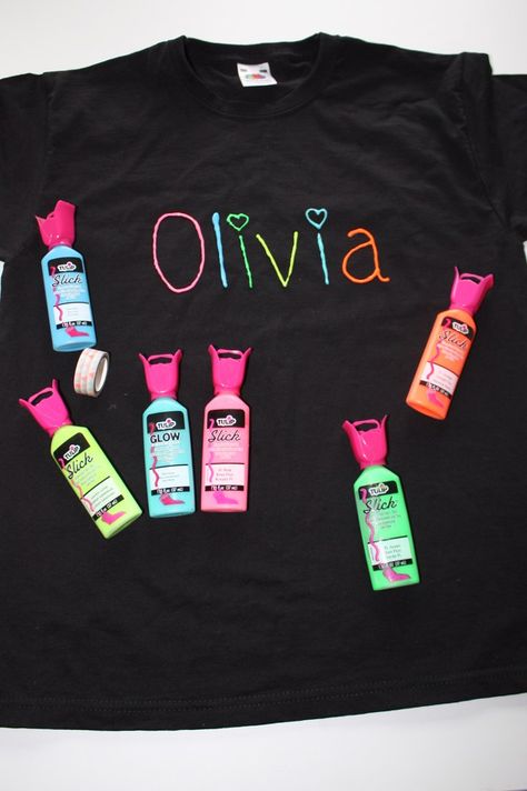 DECORATE T-SHIRTS With PUFFY PAINT with this fantastic party favour idea.  This easy five minute craft costs only a few pounds per shirt, and will make a unique personalised going home gift for your next party or gathering.  Why not  pin now or head to the blog to see more on this and other ideas for parties  and decorating. #partyideas #partyfavours #easycraftideas #puffypaint #t-shirtideas #t-shirtdesigns #handmade #partygifts #kidscrafts #kidsparty #teenparty Decorate Tshirts Ideas, Puff Paint Shirts, Puffy Paint Shirts, Glow Dance, Paint Shirt, Cake Decorating Party, Ideas For Parties, Shirt Makeover, Diy Glow