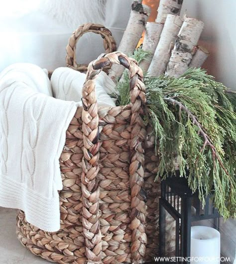 5781aaf41838941adae0c3de08585d6d After Chrismas winter decor: Birch logs, greens and throw in a basket After Christmas Decor, Decor After Christmas, Farmhouse Winter Decor, Rustic Winter Decor, Birch Logs, Dekor Diy, Diy Holiday Decor, Winter Home Decor, After Christmas