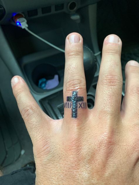 Cross Tattoo with date Ring Finger Cover Up Tattoo For Men, Cross Finger Tattoo Men, Wedding Date Tattoo Ideas, Cross Finger Tattoos, Wedding Date Tattoos, Cover Up Tattoos For Men, Ring Tattoo Designs, Thumb Tattoos, Date Tattoos