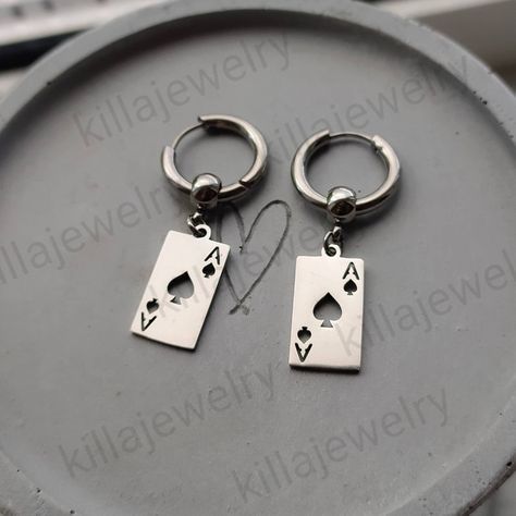 Super trendy lucky ace of spade Huggie hoop earrings in silver!♠️ Would make a great gift for any poker fan! Ear huggies and playing card charms are made of high quality stainless steel so these earrings are hypoallergenic and wont tarnish or discolour. Available as a single earring or as a pair. Hoops measure 17mm Charms measure 10x19mm Please don't hesitate to contact me with any queries or suggestions ☺️ Comes gift wrapped 🎁 Ear Huggies, Card Earrings, Men's Earrings, Clothes Embroidery Diy, Grunge Jewelry, Ace Of Spades, Jewelry Accessories Ideas, Earrings Ear, Men Earrings