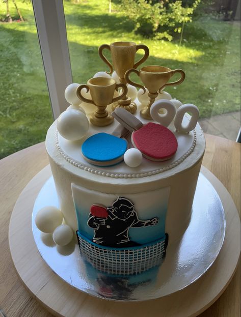 Table tennis, trophies, tennis bats, tennis balls, net, white chocolate ganache, birthday cake Table Tennis Tattoo, Cake Tennis Birthday, Table Tennis Cake, Table Tennis Cake Design, Table Tennis Wallpaper, Table Tennis Art, Tennis Cake, Table Tennis, 90th Birthday