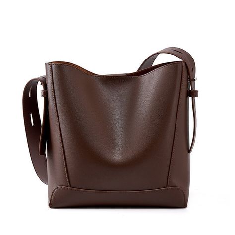 Leather Bucket Tote Bag and Handbags Shoulder Bag $50.95 USD www.smartshopper888.com use code SMARTSHOP20 and get 20% off on your first purchase. FREE SHIPPING. This Leather Bucket Tote Bag and Shoulder Bag is made from high-quality, two-layer cowhide in a variety of colors including black, salt khaki, smoky gray, golden brown, and brown. With its medium hardness and genuine leather material, this bag is durable and stylish. It features a single shoulder strap for easy carrying. Black Salt, Secret Pocket, Bucket Tote, Bucket Bags, Travel Work, Brown Brown, Leather Bucket Bag, Leather Bucket, Genuine Leather Bags