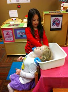 Shampoo sink for dramatic play       One of the teachers at our school was so clever coming up with this "shampoo sink".  It is a dish pan... Hair Salon Preschool Theme, Beauty Salon Theme Preschool, Community Helpers Dramatic Play Preschool, Hair Salon Preschool Dramatic Play, Beauty Salon Preschool Dramatic Play, Dramatic Play Salon, Beauty Shop Dramatic Play, Hair Salon Pretend Play, Dramatic Play Beauty Salon