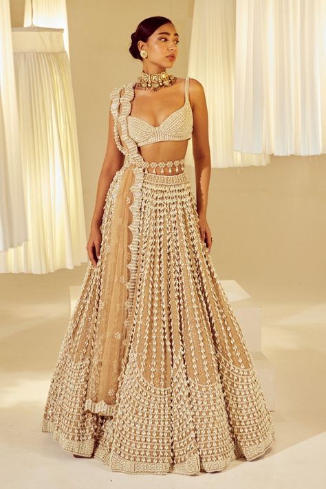 Beige pearl embellished lehenga set for women Lehenga With Pearls, Pearl Blouse Designs, Vani Vats Lehenga, Pearl Lehenga, Beige Lehenga, Vani Vats, Cancan Lehenga, Simple Lehenga, Lehenga Designs Simple