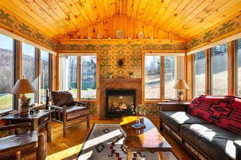 The sitting area in a cabin in Upstate New York Upstate New York Cabin, Whiteface Mountain, Buttermilk Falls, Cayuga Lake, Saranac Lake, New Paltz, Autumn Foliage, Visit New York, A Cabin