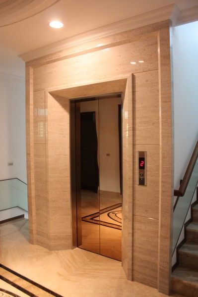 Lift cladding Lift Wall Granite Designs, Elevator Wall Cladding, Lift Foyer Design, Lift Door Design Elevator Lobby, Lift Elevation Design, Lift Granite Design, Lift Cladding Design, Lift Wall Cladding Design Granite, Lift Entrance Design