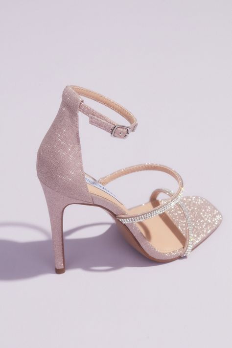 This stiletto from our exclusive Steve Madden x DB collection is fit for a bride! This megawatt sparkling pair of heels features dainty crystal encrusted straps and is covered with a gorgeous blush toned glitter. The high-shine on these wedding shoes means you’ll sparkle all night long! | Style KEYLA | Shop the designer wedding shoes collection in select David’s Bridal locations or online at davidsbridal.com | #stevemadden #stevemaddenshoes #weddingshoes Quinceanera Shoes, Shoes Heels Prom, Pageant Shoes, Hak Tinggi, Elegant Wedding Shoes, Blush Heels, Pink Wedding Shoes, Fashion Shoes Sandals, Shoes Heels Classy