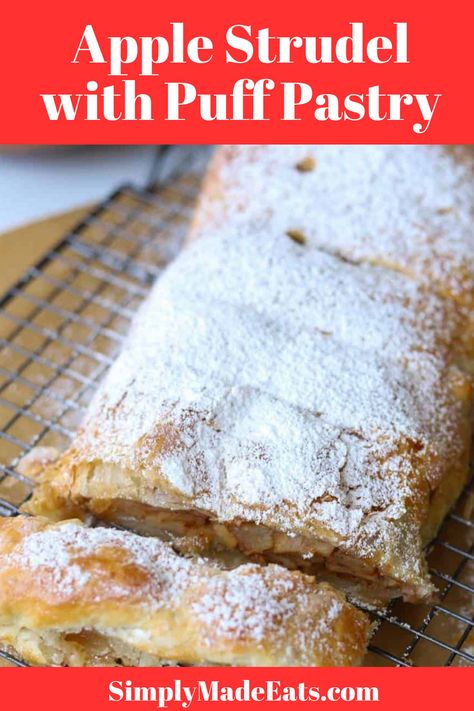 Apple strudel with powdered sugar on baking rack. Authentic German Apple Strudel Recipe, Apple Strudel With Phyllo Dough, Phyllo Apple Strudel, German Apple Strudel Puff Pastry, Apple Puff Pastry Recipes Cream Cheese, Uses For Puff Pastry, Frozen Pastry Dough Recipes, Apple Strudel With Puff Pastry, Easy Apple Desserts With Puff Pastry