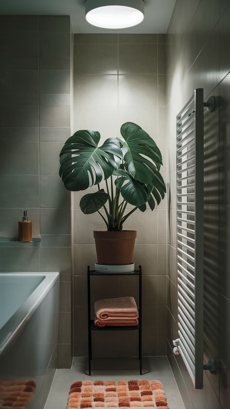 Discover how to create a serene and rejuvenating bathroom oasis featuring a stunning Monstera on a narrow RÅGRUND shelf. Paired with a sleek GRUNDTAL towel rail and a stylish VOXNAN soap dispenser, this setup is perfect for adding a touch of elegance. Don't forget the cheerful TOFTBO bath mat that brings personality to your space! Soft overhead lighting enhances the calming ambiance, making it an ideal retreat for relaxation. Ready to transform your bathroom? Click through for more styling tips and inspiration! #BathroomDecor #IKEAStyle #MonsteraMagic #HomeInspiration #PlantLovers #InteriorDesign #RelaxingSpaces Ikea Style, Bathroom Oasis, Bathroom Aesthetic, Overhead Lighting, Towel Rail, Styling Tips, Soap Dispenser, Bath Mat, Bathroom Decor