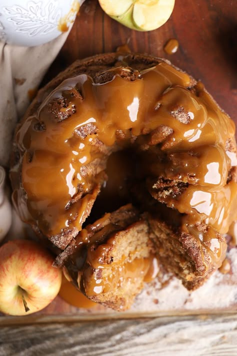 The Best Apple Cider Donut Cake with Salted Caramel. Made with fresh harvest apples and an irresistible homemade salted caramel drizzle. Think like the best caramel apple you’ve ever had, but with way more caramel… and cake too! This Apple Cider Donut Cake with Salted Caramel is seriously the best apple cake you will ever make! Cider Donut Cake, Apple Cider Donut Cake, Best Apple Cider, Homemade Salted Caramel, Cake With Caramel, Donut Cake, Caramel Drizzle, Desserts Vegan, Apple Cider Donuts