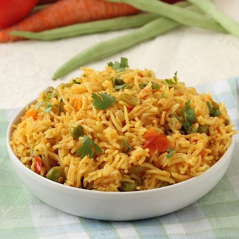 Vegetable Pulao - Spicy Rice Dish with Healthy Vegetables (carrot, green peas, tomato, beans etc.) -  Perfect for Lunchbox -Serve with plain curd or raita in lunch or dinner - Cook this pulav in a pressure cooker or a pan (see tips on recipe page) according to availability. - Step by Step Pictures Recipe Kashmiri Pulao, Tawa Pulao, Vegetable Pulao Recipe, Veg Pulao, Poha Recipe, Pav Bhaji Masala, Indian Rice Recipes, Saffron Rice, Pav Bhaji