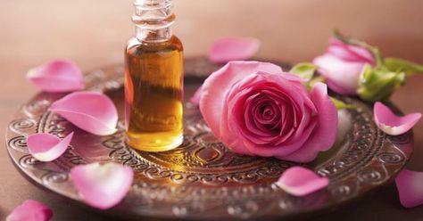 There is more to roses than their beauty, as rose petals can also be used to make rose oil, which offers several benefits. Researchers at Srinakharinwirot University in Thailand tested the effects of rose oil massage on the human nervous system. The results of the study, published in the February 2009 issue of "Natural Product... Oils For Migraines, Essential Oils For Inflammation, Essential Oils For Migraines, Retinol Night Cream, How To Make Rose, Handmade Skincare, Patchouli Essential Oil, Essential Oil Benefits, Rose Essential Oil