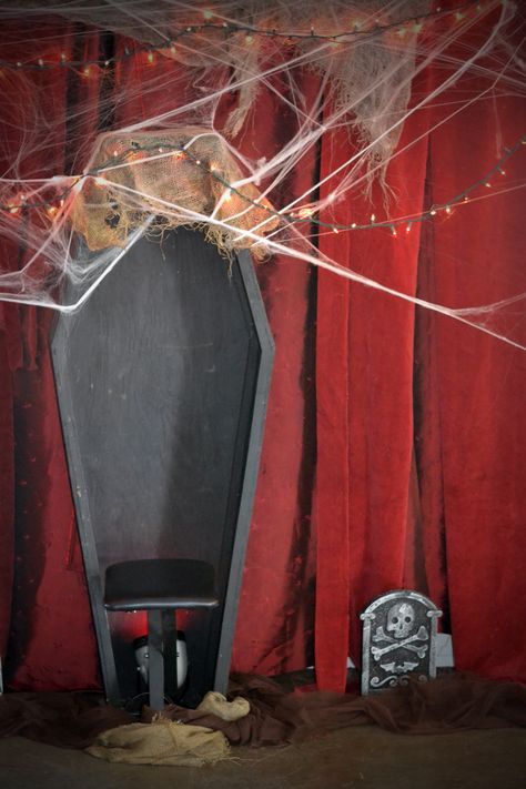 blogger said: Close up of our coffin photo booth with red velvet curtain, black open coffin, fake cob webs, red string lights and fake graveyard with brown tulle. Coffin Photo Booth, Photozone Ideas, Porta Halloween, Halloween Photo Booth, Scream Halloween, Halloween Dance, Halloween Cans, Halloween Backdrop, Photos Booth