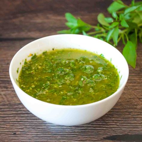 Add a burst of flavor to your meals with our basil chimichurri sauce recipe! This vibrant sauce combines fresh basil, garlic, and vinegar for a zesty and delicious addition to meats, vegetables, and more. Basil Chimichurri Sauce, Best Chimichurri Sauce, Basil Chimichurri, Oregano Recipes, Sweet Potato Casserole With Marshmallows, Chimichurri Sauce Recipe, Marshmallow Topping, Basil Sauce, Chimichurri Sauce