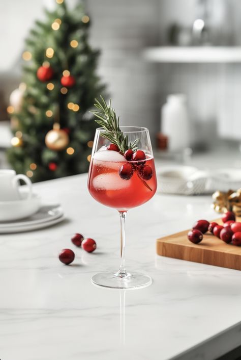 Bright, bubbly, and bursting with holiday cheer, the Cranberry Limoncello Spritz is a delightful blend of tangy limoncello, tart cranberry juice, and sparkling prosecco. This elegant cocktail is perfect for festive celebrations or as a refreshing aperitif. Cranberry Limoncello Spritz Wine GlassBar SpoonJigger 2 oz prosecco1.5 oz cranberry juice1 oz limoncello1 oz sparkling watercranberries and Limoncello Cranberry Cocktail, Holiday Spritz, Cranberry Prosecco, Best Christmas Cocktails, Cocktails Easy, Christmas Cocktails Easy, Limoncello Spritz, Limoncello Cocktails, Pear Cocktails