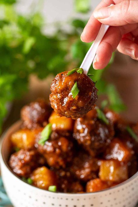 Bring a little tropical flavor with these Crockpot Hawaiian meatballs! They combine the savory flavors of meatballs with pineapple sweetness for juicy island-style flavor and the slow cooker makes for tender bites and easy breezy cleanup. Crockpot Meatballs Grape Jelly Pineapple, Slow Cooker Pineapple Meatballs, Pineapple Meatballs Crockpot, Pineapple Meatballs Hawaiian, Hawiian Meatballs, Hawaii Meatballs, Meatballs Recipe Crockpot, Crockpot Hawaiian Meatballs, Meatballs With Pineapple