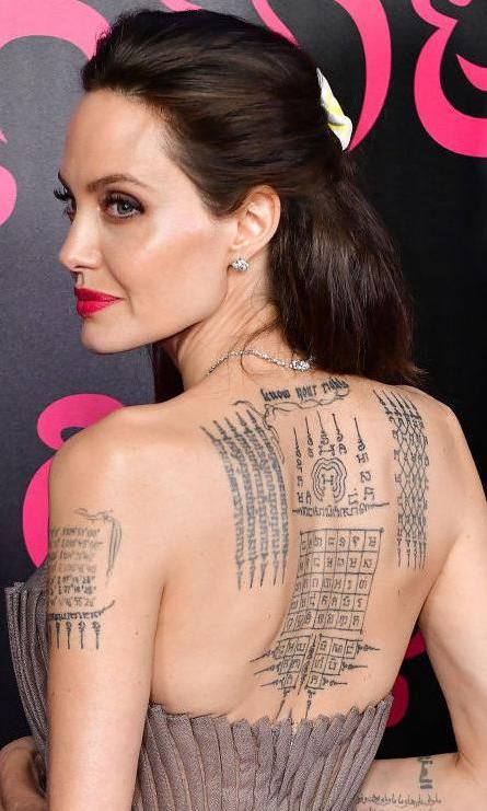 Iconic Tattoos, Angelina Jolie Tattoo, Angelina Jolie Photos, Tattoo Cover Up, Tattoo Cover, Tattoo Cover-up, Deep Meaning, Dark Skin Women, Charlize Theron