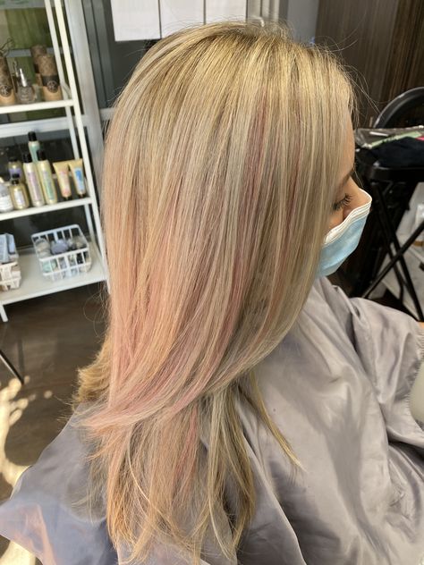 Soft blonde with ribbons of subtle pink. Light Pink And Blonde Hair Highlights, Subtle Pink Blonde Hair, Blonde With Subtle Pink, Blonde Hair With Pink Extensions, Light Pink In Blonde Hair, Blonde W Pink Highlights, Subtle Pink Highlights Blondes, Pink Hair Subtle, Blonde With Light Pink Highlights