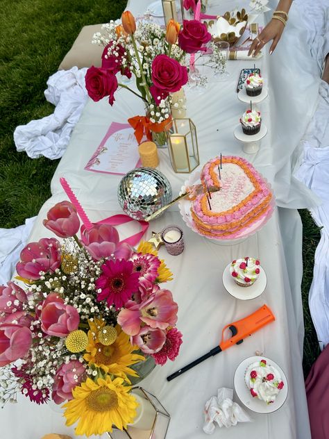 midsummer, backyard party, flowers, backyard lights, candles, birthday party, aesthetic, summer, summer bucket list, pink, orange, pink and orange, disco balls, cupcakes, cake, heart shaped cake, aesthetic cake, table layout Birthday Party Backyard, Cupcakes Summer, Garden Party Table, Orange Candles, Cute Pink Flowers, Orange Birthday Parties, 18th Birthday Party Themes, Cake Heart, Heart Shaped Cake