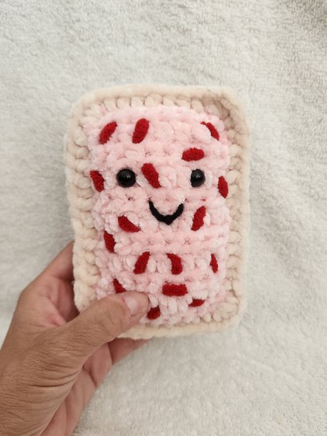 This is my cherry poptart pastry plushie. So chunky and squishy! Made from cozy soft yarn and stuffing. Perfect for a small gift.  Each item is handmade by me, Katie! There may be slight differences in each item from the photo shown. For example, the sprinkles may be placed differently but will be the same color. Colors and overall look and shape will match the photo. I have this item available now so I can ship it next day. If you want more than the quantity shown please send me a message and I Cherry Poptart, Cherry Crochet, Tart Pastry, Kawaii Cherry, Plushie Amigurumi, Pop Tart, Crochet Plushie, Kids Crochet, Cherry Tart