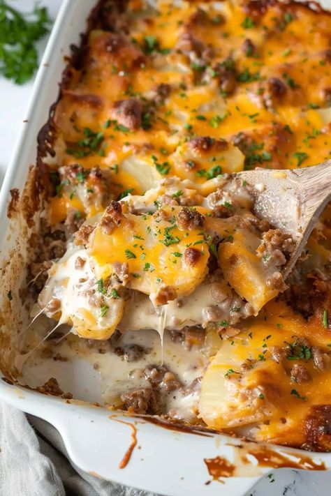 This sausage potato casserole is savory, creamy, and oh-so cheesy! It's an easy meal the entire family will flip for. Potato And Pork Recipes, Ground Sausage Potato Casserole, Sausage Potatoes Casserole, Creamy Sausage And Potato Casserole, Creamy Sausage And Potatoes, Italian Sausage Potato Casserole, Ground Sausage And Potatoes Recipes, Ground Sausage And Potatoes, Ground Sausage Casserole