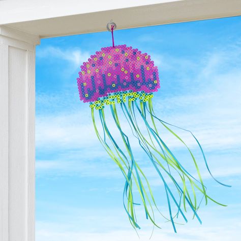 Make this cute fuse bead jellyfish wind streamer to hang on Jellyfish Perler, Bead Jellyfish, Perler Projects, Easter Egg Ornaments, Bee Wall, Blue Bear, Snowy Trees, Bead Ideas, Crafty Kids