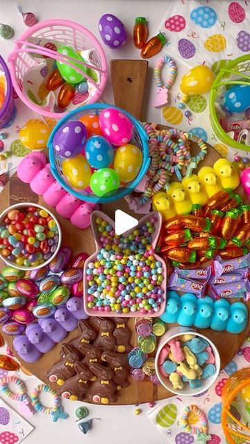 Amy Locurto - Disney Fan & Lifestyle Blog on Instagram: "Best Easter Candy Board! Everyone will want to hop over and fill tiny napkin lined Easter baskets with treats.  💕🐰 —> Comment “EasterFun” and I will send you details and more Easter ideas.   Candy bowls are OUT… candy boards are IN.   I’m a sucker for Easter candy. 🐰 I don’t know what it is, but I get so happy when I see the chocolate bunnies, malted eggs, Peeps, jelly beans and pastel colored candy packaging hit the stores!  This candy is from @orientaltrading and a good example of what you can do to wow guests at  at a spring gathering or Easter dessert table.  #eastercandy #eastertreats #candyboard #snackboard #charcuterieboard #easterdessert #springparty #partyfoodideas #livinglocurto #easterideas #eastertable #desserttable #c Candy Boards, Easter Dessert Table, Candy Board, Chocolate Bunnies, Snack Board, Candy Packaging, Spring Party, Easter Candy, Easter Dessert