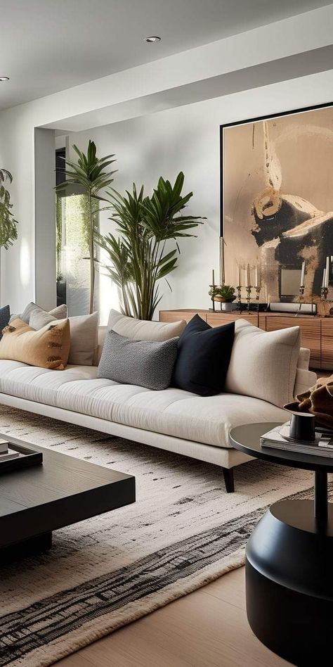 Decorating A Long Wall In Living Room, Earthy Minimalist Living Room, Elegant Modern Living Room Inspiration, Beige Sofa Living Room Color Schemes, Dark Modern House Interiors, Charcoal Couch Living Room, Big Living Room Ideas, Modern Living Room White, Sleek Modern Living Room