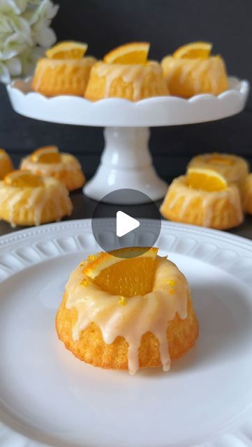 Food with Style 🤍 on Instagram: "Click here for the Recipe 🤍

Mini Orange Gugelhupfs

Savor the fruity taste of oranges in these delightful mini Gugelhupfs. These bite-sized treats are perfect for special occasions or simply as sweet indulgences in between. ☺️🤍

📝 Ingredients:

For 12 mini bundt molds, each with a diameter of 7 cm:

- 125 g soft butter
- 125 g sugar
- 2 eggs (Size M)
- 1 tablespoon yogurt
- 150 g flour
- 1 tsp baking powder
- Juice and zest of 1 orange

For the Orange Glaze:

- 100 g powdered sugar
- 5 tbsp freshly squeezed orange juice

For Decoration:

- Orange slices

🤍 Preparation:

1. Preheat the oven to 180 degrees Celsius and grease the mini Gugelhupf molds thoroughly.

2. Cream together butter and sugar in a bowl. Add the eggs one at a time, mixing well after Orange Bunt Cake, Moroccan Orange Cake, Orange Cake Decoration, Orange Bundt Cake, Squeezed Orange Juice, Orange Cupcakes, Easy Teas, Frosting Recipes Easy, Poppy Seed Cake