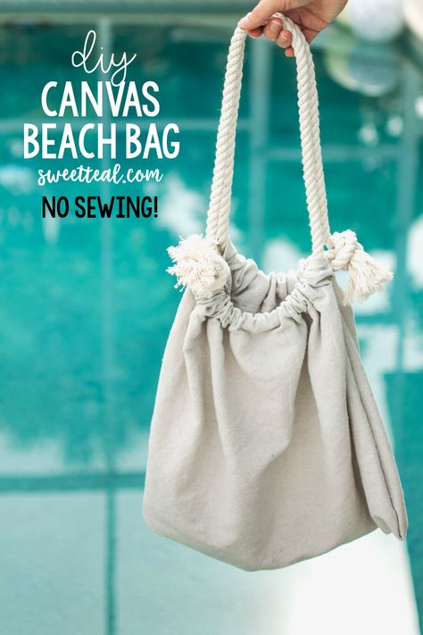 Make this bag in less than 10 minutes without any sewing!! It's the easiest beach bag you'll ever make! It's nautical too with the canvas drop cloth and cotton rope. Diy Beach Bag, Diy Bags No Sew, Canvas Drop Cloths, Diy Clothes Refashion, Canvas Beach Bag, Canvas Diy, Beach Fabric, Diy Bags Purses, Tote Bags Sewing