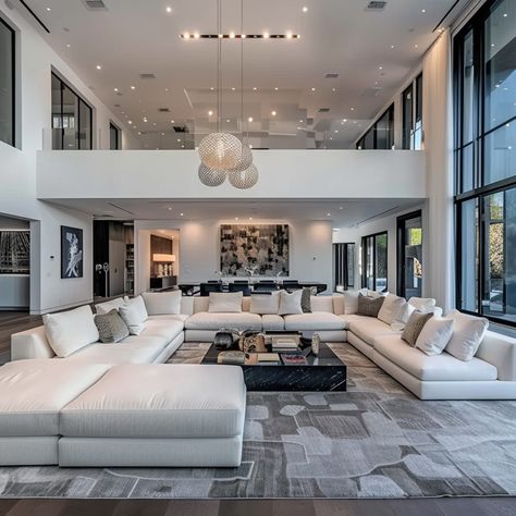 Luxurious Living Room in Jake Paul's Calabasas Mansion Large Sectional Sofa Modern, Living Room Decor Big Space, Modern Mansion Inside, Regular Living Room, Family Area Interior Design, Mansion Living Room Luxury Modern, High Ceiling Living Room Lighting, Modern Luxury Living Room Apartments, Cozy Large Living Room