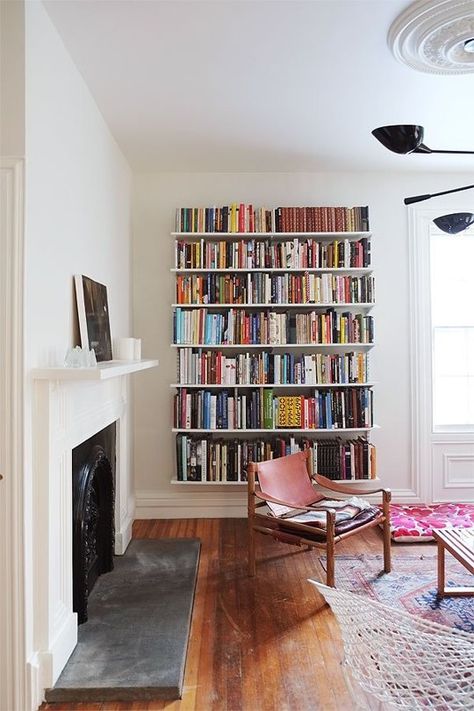 8 Spaces that Make Track Shelving Look Good | Apartment Therapy Track Shelving, Home Libraries, Open Shelves, Home Library, A Living Room, Book Shelf, Decor Rustic, My New Room, Home Fashion