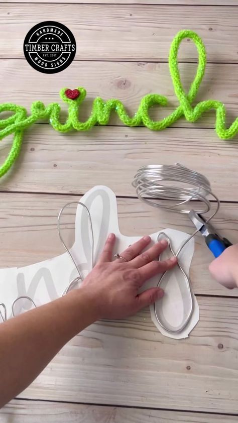 49K views · 715 reactions | Here’s the tutorial on how to make this yarn sign, it would look cute on a Grinch themed Christmas tree.🎄💚❤️😊 #grinch #diychristmas #diycrafts | By Timber Crafts | Facebook Grinch Yarn Craft, Grinch Arm Diy, How To Make A Grinch Hand, Grinch Themed Ornaments, The Grinch Ornaments Diy, Grinch Crafts To Sell, Grinch Wood Christmas Tree, Grinch Wood Tree, Grinch Drawings