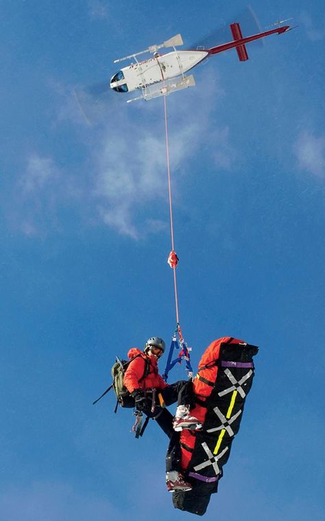 Bradly J. Boner	Teton County Search and Rescue medical director Will Smith rides below a helicopter with a litter carrying a backcountry snowboarder who broke his leg north of Calvert's Ridge on Mt. Glory. The patient was evacuated using the short-haul me Search And Rescue Helicopter, First Responder Aesthetic, Search And Rescue Aesthetic, Flight Medic, Helicopter Rescue, Coast Guard Rescue, Rescue Diver, Firefighter Paramedic, Goal Zero