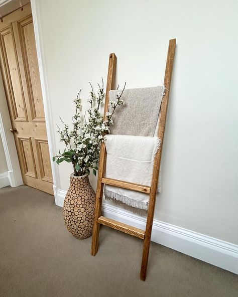 Simply Beautiful 🌟 Our handmade wooden display ladder is not only slimline and pleasing to the eye, but also incredibly versatile. It serves as the perfect solution for hanging blankets & towels and accessories, adding a touch of rustic charm to the space ❤️ Its simple yet elegant design makes it a practical and stylish addition to any room in your home 🤩 https://ourhometoyours2017.etsy.com/listing/1731453200 ⭐️⭐️⭐️⭐️⭐️ #ourhometoyours #Transform #homestyle #Reclaimed #handmade #craftsma... Blanket Ladder Aesthetic, Bedroom Ladder Decor, Ladder On Wall Decor, Ladder On Wall, Throw Ladder, Display Blankets, Blanket Ladder Ideas, Hanging Blankets, Wooden Ladder Decor