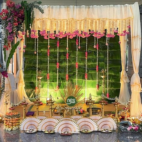 N❤️D Malayalee-inspired wedding decor encapsulates the essence of tradition and elegance. From intricate kasavu saree-inspired mandap drapings to fresh floral arrangements reminiscent of Kerala’s natural beauty, every detail is thoughtfully chosen. The welcome area was a visual delight with a ‘pookalam’ design, creating a warm atmosphere, and a huge welcome mirror added a touch of beauty to the entrance.  . #nallanaal #teamnallanaal #eventplanner #weddingstyling #eventstyling #indianwedding #... Malayalee Wedding, Welcome Mirror, Pookalam Design, Fresh Floral Arrangements, Kasavu Saree, Wedding Aesthetic, Ceiling Decor, Wedding Deco, Event Styling