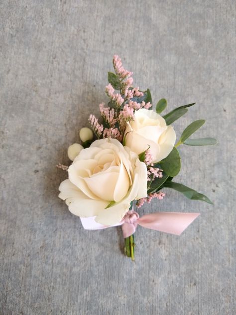 White majolica spray roses, blush tinted caspian, white hypericum berries, gunni eucalyptus boutonniere //Celebration Flair Pale Pink Boutonniere, Blush And White Corsage, White Blush Boutonniere, Blush Corsage And Boutonniere, Spray Rose Buttonhole, Groomsmen Boutonniere Pink, Boutineer Ideas Wedding Simple, Wedding Boutonniere Pink, Blush And White Boutonniere