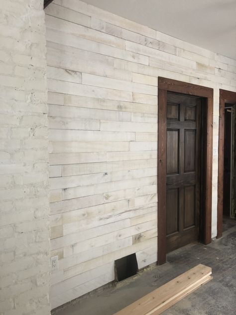 Whitewash pallet wall. Coffee stained pine door. Mahogany stained cedar trim. Whitewash Doors Interior, Doorway Trim, Stained Cedar, Dark Doors, Stain On Pine, Stained Doors, Pine Doors, Pine Walls, Mahogany Stain