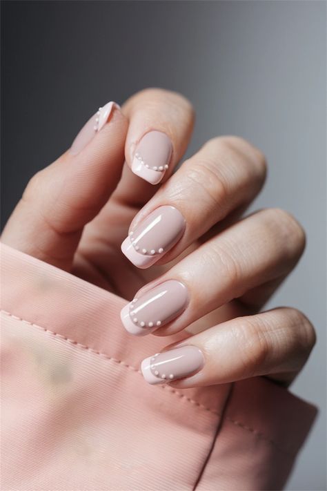 Discover the beauty of simplicity with these elegant short nail ideas that celebrate natural nails. The perfect canvas, short nails provide an ideal backdrop for a delicate nude polish adorned with subtle white florals. This style enhances your natural look while adding a touch of charm and femininity. Embrace your authentic beauty with this effortless nail design! Nail Ideas For Natural Nails, Ideas For Natural Nails, Short Nail Ideas, Nude Polish, Authentic Beauty, Short Nail, White Florals, Natural Look, Natural Nails