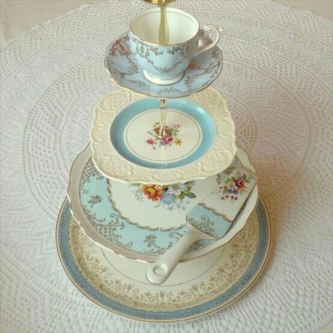 Homemade cake stand from vintage items.  Put large flower in the teacup! Homemade Cake Stands, Vintage Pasta, Dessert Stands, Tiered Server, Dessert Aux Fruits, Tea Cups And Saucers, Dessert Party, Tiered Cake, Homemade Cake