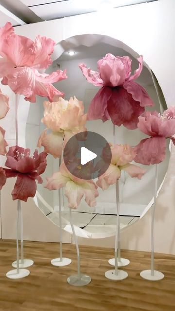 Zoi Decorative Design on Instagram: "Pink series, purple series, cream yellow series of giant paper iris flowers!#Artificialflowers #giant flower#wedding	 #party #Window display#peony #peonyflower #paperflowers#organza#eva#mall #weddingdecor #weddingideas #partyideas #partydecor #rose" Giant Flower Wedding, Paper Iris, Flowers Iris, T Party, Giant Roses, Organza Flowers, Cream Yellow, Iris Flowers, Table Flowers