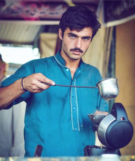 Arshad Khan, 18, is a tea seller at Islamabad's Sunday Bazaar, photographed by Javeria Ali in a picture posted on 14 October, 2016 Chai Wala, Rugged Look, South Asia, Hot Tea, Instagram Foto, People Around The World, Blue Eyes, Nikon, Pretty People