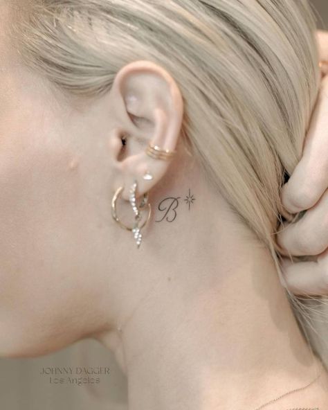 Letter "B" and north star tattoo located behind the Letter Tattoos Behind The Ear, R Tattoo Behind Ear, Small Letter B Tattoo, Letter Tattoo Behind Ear, B Finger Tattoo, Initial B Tattoo, Cursive B Tattoo, Tattoos For Behind The Ear, Tattoo Letter B