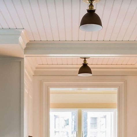 Carpenter & MacNeille on Instagram: "A crisp, white, beadboard ceiling and C&M custom cabinetry enhance the classic cottage aesthetic of this renovated 1920s home by the sea.⁠ ⁠ Project: Lobster Cove⁠ Photographer:@michaeljleephotography⁠ ⁠ #restoration #architecture #oceanhome #renovation #customcabinetry #beadboard" Bead Board On Ceiling, Beadboard Kitchen Ceiling, Horizontal Beadboard Walls, White Beadboard Ceiling, Beadboard Ceiling Kitchen, Beadboard Kitchen Walls, White Beadboard Kitchen, Stained Beadboard Ceiling, Horizontal Beadboard