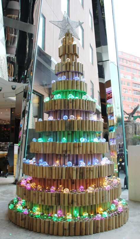 Hundreds of bamboo cuts and recycled nails were gathered from the hotel’s current refurbishment to build this 3-metre tall sustainable Christmas tree. To make it more festive, the tree is decked with energy efficient LED light bulbs. Christmas Decor Made From Recycled Materials, Sustainable Xmas Tree, Christmas Tree Ideas Recycled Materials, Christmas Tree Bamboo, Christmas Tree Sustainable, Bamboo Christmas Tree Diy, Christmas Tree From Recycled Materials, Bamboo Christmas Decor, Eco Friendly Christmas Tree