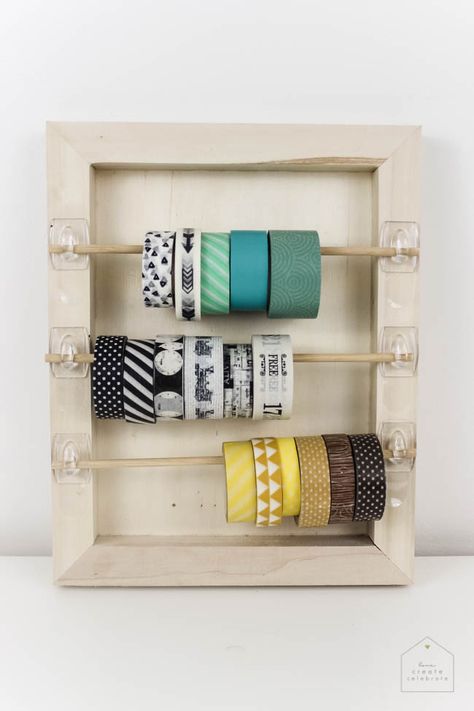 Organize your craft space with this simple DIY that will take you less than 5 minutes! Great for washi tape, ribbon, twine, etc. and PERFECT for any craft space! Diy Washi Tape Organizer, Washi Tape Organizer, Ribbon Organizer, Washi Tape Storage, Crafts Simple, Ribbon Holders, Tape Organizer, Tape Storage, Craft Workshop