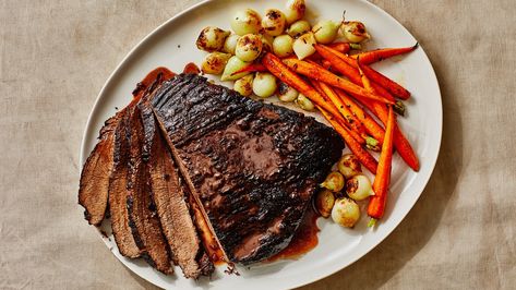 Braised Brisket With Pearl Onions and Carrots https://www.bonappetit.com/recipe/braised-beef-brisket #vegetarian #recipes Tender Brisket, Braised Brisket, Beef Brisket Recipes, Carrots Recipe, Homemade Chicken Stock, Hanukkah Food, Pearl Onions, Hosting Dinner, Cooked Carrots