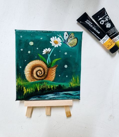 This pin containing a miniature painting of a flower and butter fly and it is placed on a wooden easel stand.
This beautifull painting available on etsy shop. Double click on the pin to get it. Etsy shop, etsy seller. Painting About Nature, Miniature Canvas Painting, Peacock Canvas, Small Home Decor, Deer Painting, Flower And Butterfly, Cute Miniature, Painting Snow, Cute Canvas Paintings