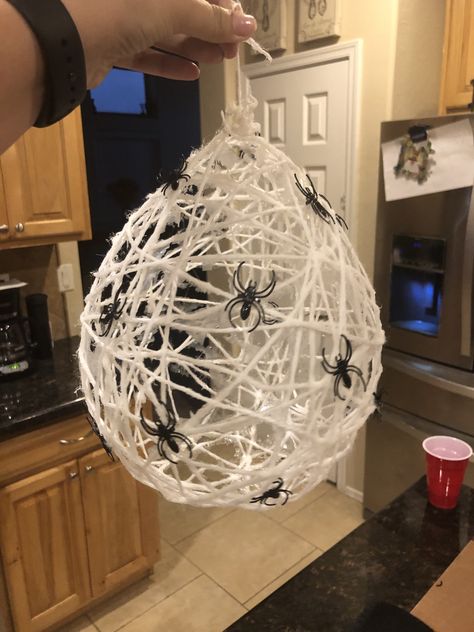 Spider web made from a balloon, yarn and glue Twine Spider Web, Halloween Yarn Spider Web, Halloween Yarn, Giant Spider, Creepy Halloween Decorations, Easy Halloween Crafts, Halloween Spider Web, Creepy Halloween, Yarn Ball